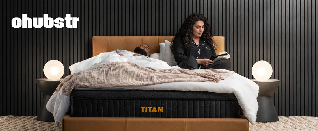man sleeping next to a woman sitting on edge of a Titan Mattress